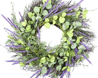 May include: A wreath made of twigs with purple lavender and green eucalyptus sprigs.