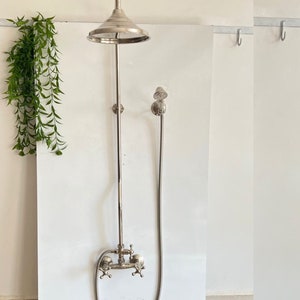 Contemporary Unlacquered Brass Shower System with High-Pressure Tub Filler and Matte Nickel Handheld Round Shower Head