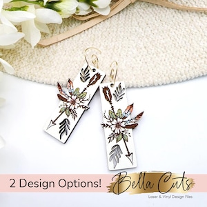 May include: Two pairs of wooden earrings with a white background. Each earring features a floral design with arrows and feathers. The earrings are designed to be laser cut and are available in two different designs.