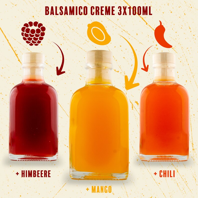 May include: Three glass bottles of balsamic creme with wooden stoppers. The bottles contain red, orange, and yellow liquids. The text at the top says "Balsamico Creme 3x100ml". The bottom of the bottles have the text "+ HIMBEERE", "+ MANGO", and "+ CHILI".