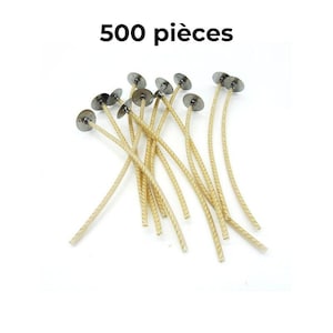 Puede incluir: Primer plano de 500 mechas de vela con pestañas metálicas. Las mechas son de color beige y tienen una textura trenzada.