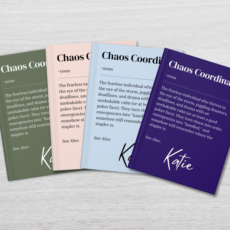 May include: Four different colored cards with the word "Chaos Coordinator" and a definition of the term. The definition is about a person who thrives in chaos and can handle emergencies. The cards are green, pink, blue, and purple. The name "Katie" is written on the purple card.