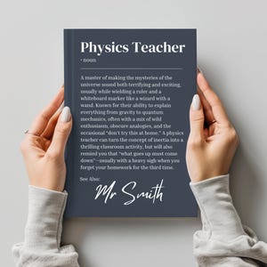May include: A dark blue printable poster with a definition of a "Physics Teacher" as a noun. The definition describes a physics teacher as a master of making the mysteries of the universe sound both terrifying and exciting. The poster also includes the name "Mr. Smith" at the bottom.