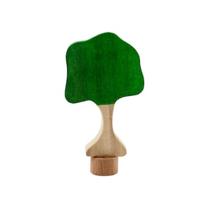 May include: A wooden tree toy with a green canopy and a natural wood trunk and base. The tree is a simple, stylized design, perfect for imaginative play or as a decorative item. The tree is approximately 4 inches tall.