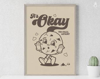 May include: A brown and white illustration of a cookie with a face and the text "It's Okay to Fall Apart".