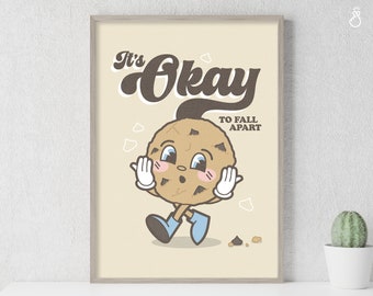 May include: A beige background with a brown cartoon cookie with chocolate chips and a smiling face. The cookie is wearing blue shoes and white gloves. The text "It's Okay to Fall Apart" is written in brown text above the cookie.