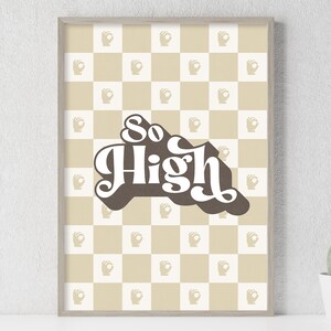 May include: A framed print with a beige and white checkered background. The print features the text "So High" in brown and white lettering.