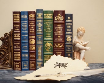 Colección de libros encuadernados en cuero FIRMADOS