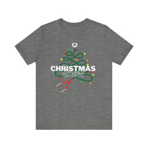 Nurse and Medical Christmas crew stethoscope christmas tree with lights fun holiday shirt Unisex Jersey Short Sleeve Tee