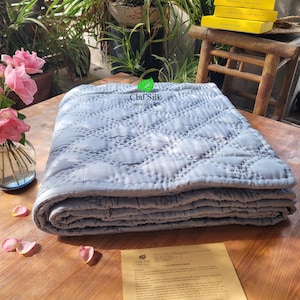 Hand-stitched quilted blankets from silk-  silk blankets woven by silkworms- quilted blankets with the inside also made of silk