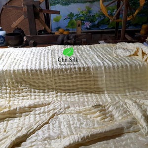Hand-stitched quilted blankets from silk-  silk blankets woven by silkworms- quilted blankets with the inside also made of silk
