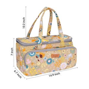 May include: A beige quilted tote bag with a floral print and a gray zipper. The bag has two top handles and measures 14.9 inches wide, 6.7 inches tall, and 7 inches deep. The bag also has a label that says "Hengfesh".