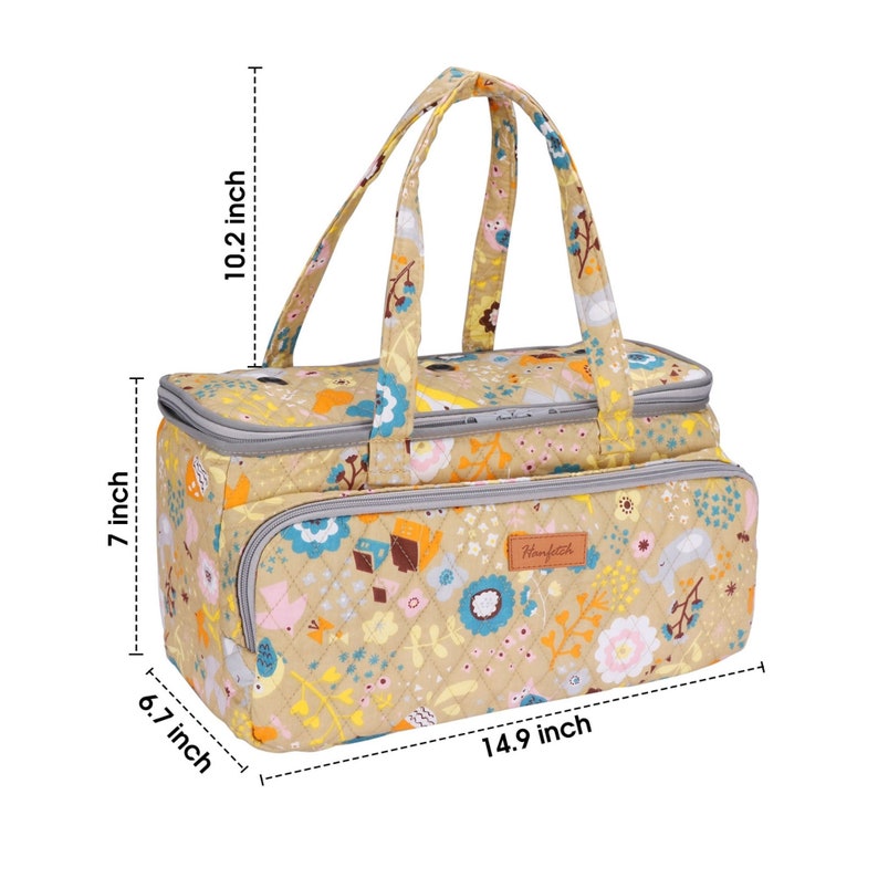 May include: A beige quilted tote bag with a floral print and a gray zipper. The bag has two top handles and measures 14.9 inches wide, 6.7 inches tall, and 7 inches deep. The bag also has a label that says "Hengfesh".