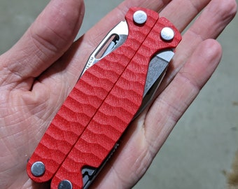 BALANZAS SOLAMENTE - Balanzas Leatherman Charge G10 - Rojas