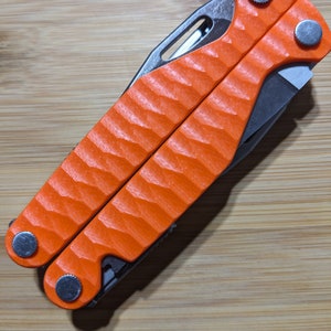 ALLEEN WEEGSCHAAL - Leatherman Charge G10-weegschaal - oranje