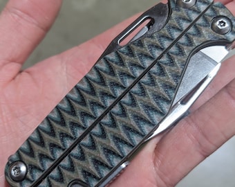 SOLO BALANZAS - Balanzas Leatherman Charge G10 - Tornillos MultiCam Camo-Torx