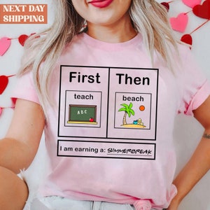 a woman wearing a pink t - shirt that says first then teach