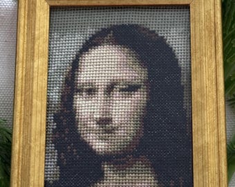 Cuadro en punto de cruz de la Mona Lisa de Leonardo da Vinci