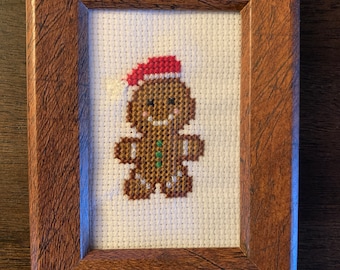 Imagen de punto de cruz del hombre de jengibre de Navidad