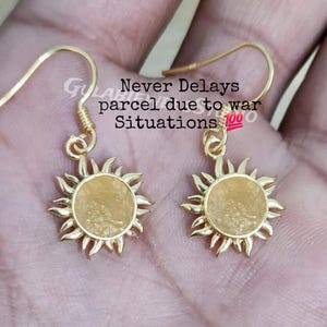 Kolczyki ze szkła pustynnego z surowego libijskiego srebra z motywem słońca