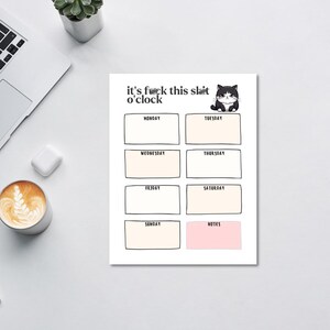 May include: A printable weekly planner with the text "it's f*** this s*** o'clock" and a cartoon cat with a grumpy expression. The planner has spaces for each day of the week, Monday through Sunday, and a notes section.
