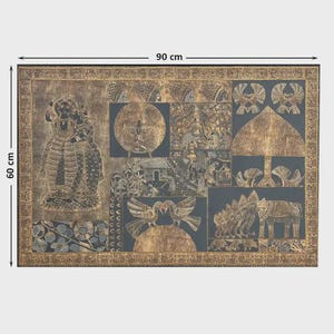 May include: A rectangular wall art piece, 35 inches wide and 24 inches tall, featuring a collage of gold and black embossed images. The artwork includes figures, animals, and geometric shapes, framed with a gold border. The overall theme is cultural and decorative.