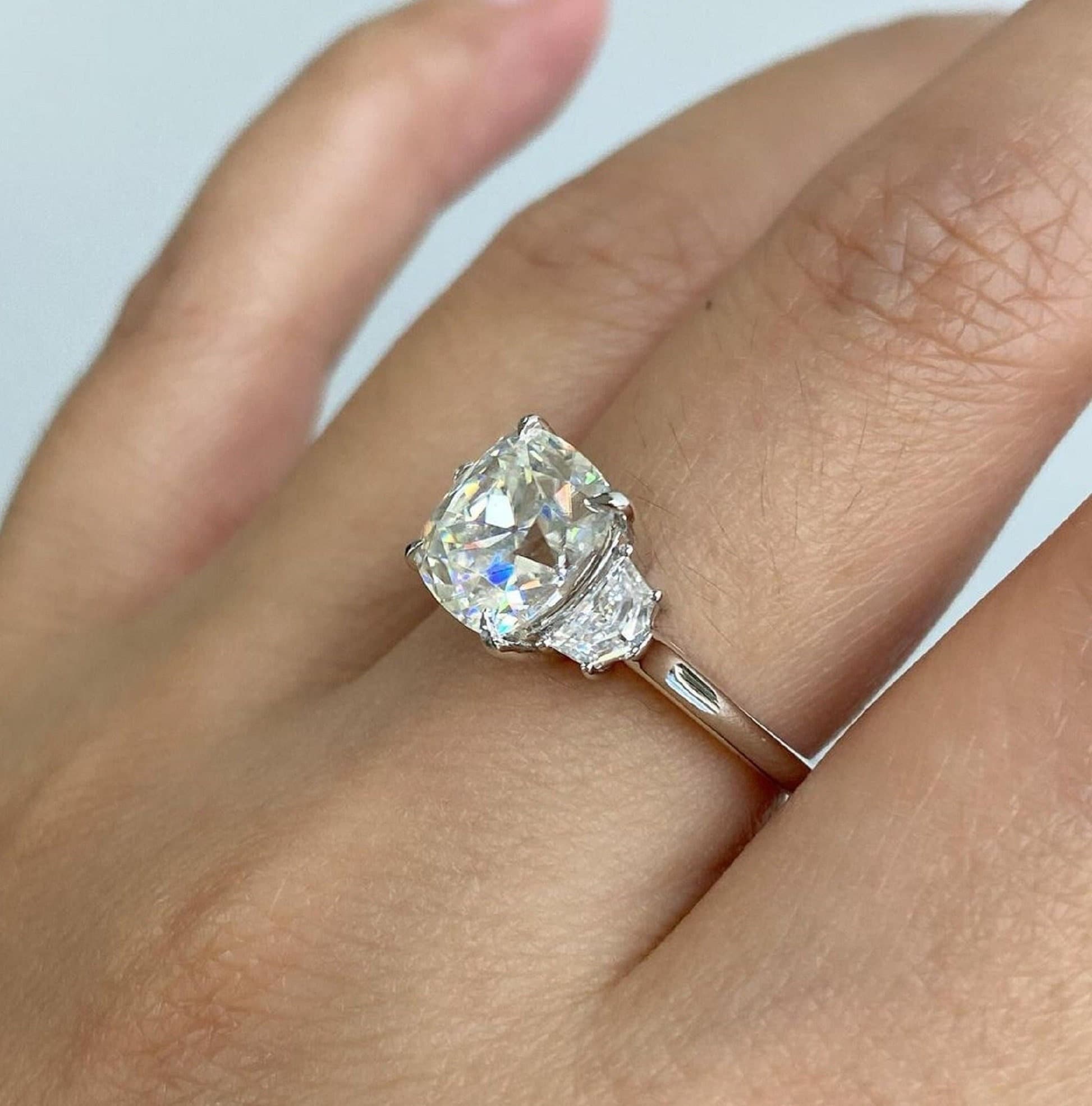 Cushion cut with trapezoid side stones discount