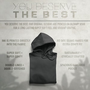 May include: A charcoal gray hooded sweatshirt with a kangaroo pocket. The text "YOU DESERVE THE BEST" is printed in white at the top of the image. The text "INK IS PRINTED DIRECTLY INTO THE FABRIC" is printed in black on the left side of the image. The text "SUPER SOFT + SUPER COMFY" is printed in black on the left side of the image. The text "DOUBLE-LINED + DOUBLE-STITCHED" is printed in black on the left side of the image. The text "NO SIDE SEAMS MAKES FOR EXTRA COMFY FIT" is printed in black on the right side of the image. The text "SUSTAINABLY + ETHICALLY CRAFTED" is printed in black on the right side of the image. The text "SPACIOIUS KANGAROO POCKET" is printed in black on the right side of the image.