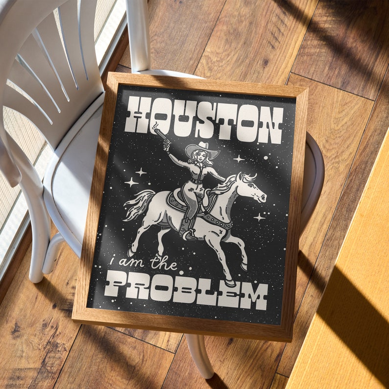 May include: Black and white illustration of a woman riding a horse with a gun in her hand. The text "HOUSTON I am the PROBLEM" is written on a black background.