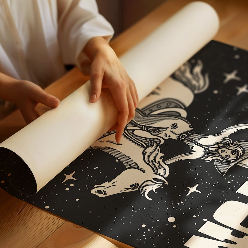 May include: A black and white illustration of a woman riding a horse with stars in the background. The woman is wearing a hat and a long dress. The horse is rearing up on its hind legs. The illustration is printed on a black canvas.
