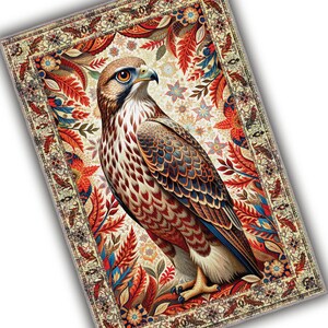 May include: A decorative rectangular rug featuring a detailed illustration of a hawk. The hawk has brown, white, and blue feathers, with a yellow beak and eye. The rug has a floral border with red, orange, and blue leaves and flowers.