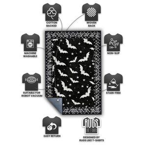 May include: Black rectangular rug with a white bat and star pattern. The rug has a decorative border and is labeled "Cotton Backed", "Machine Washable", "Non-Slip", and "Stain-Free". The rug is designed by "Rugs Like T-Shirts".