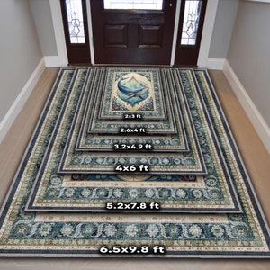 May include: A collection of decorative rugs in various sizes, ranging from 2x3 ft to 6.5x9.8 ft. Each rug features a detailed border and a central design with a whale illustration in shades of blue, beige, and green. The rugs are displayed in a hallway.
