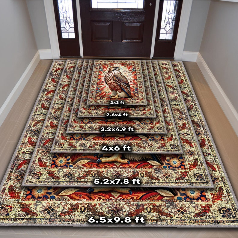 May include: A collection of decorative rugs in various sizes, featuring a central design of a hawk or eagle. The rugs have a detailed, ornate border with floral and feather motifs. Sizes range from 2x3 ft to 6.5x9.8 ft.