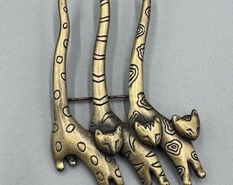 Broszka Vintage JJ Jonette Jewelry 3 Cats Trio z długimi ogonami w stylu azteckim