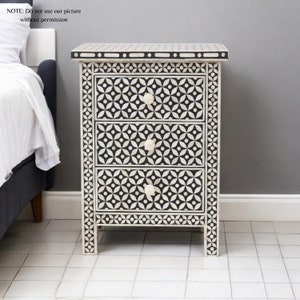 Bone Inlay Bedside Table with Antique Finish,
Handcrafted Bone Inlay Bedside Nightstand,
Bone Inlay Nightstand with Storage Drawer,
Bone Inlay Bedside Table for Chic Decor,
Designer Bone Inlay Nightstand