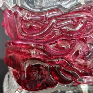 Sanders & Wallace pink studio glass candlestick, signed