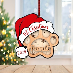 Gepersonaliseerde eerste kerst hond ornament svg, hond pootafdruk met kerstmuts ornament svg, kerstcadeau svg, lasergesneden Glowforge, digitaal