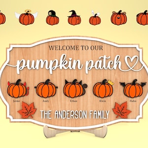 May include: A wooden sign with the text "Welcome to our pumpkin patch" and a heart. The sign has a fall theme with carved pumpkins and leaves. The names Jaime, Andy, Ethan, Klein, and Hahn are written below the pumpkins.