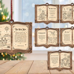 May include: A collection of five laser-cut wooden book-shaped ornaments featuring engraved biblical scenes and text. Each ornament displays detailed illustrations of the nativity, the star, and the wise men, accompanied by verses from Luke and Matthew.