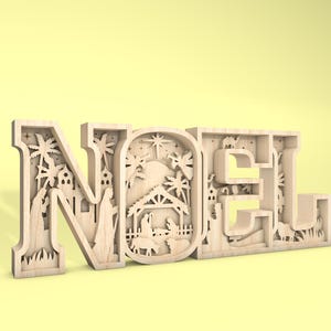 May include: A wooden cutout of the word "NOEL" with a detailed nativity scene design inside each letter. The cutout is painted in a light wood color and has a rustic, vintage feel.