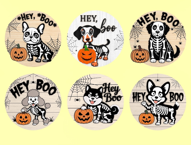 Może przedstawiać: Kolekcja sześciu drewnianych kręg&oacute;w o tematyce Halloween. Każdy przedstawia inną rasę psa w kostiumie szkieletu, dynię i frazę "Hey Boo". Projekty są w kolorze czarnym i białym z pomarańczowymi akcentami.