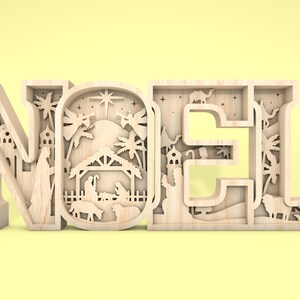 May include: Wooden cutout of the word "NOEL" with a nativity scene design inside each letter. The scene includes a stable, a star, palm trees, and figures of Mary, Joseph, and baby Jesus.