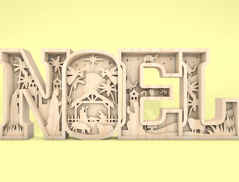 May include: Wooden cutout of the word "NOEL" with a nativity scene design inside each letter. The scene includes a stable, a star, palm trees, and figures of Mary, Joseph, and baby Jesus.