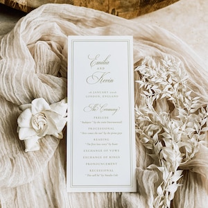 May include: A rectangular white wedding ceremony programme card with gold text and borders. The text reads Emilia and Kevin, 18 January 2018, London, England, The Ceremony, Prelude, Processional, Reading, Exchange of Vows, Exchange of Rings, Pronouncement, Recessional.