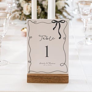 Table Numbers With Ribbon Black Bow Table Numbers Sign Template | Whimsical Table Number Sign ...