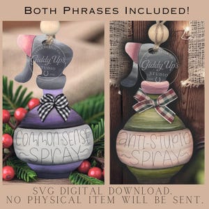 May include: Two wooden spray bottle ornaments, one purple with "Common Sense Spray" and a black and white bow, the other green with "Anti-Stupid Spray" and a plaid bow. Both have a wooden bead and the text "Giddy Up's Studio".