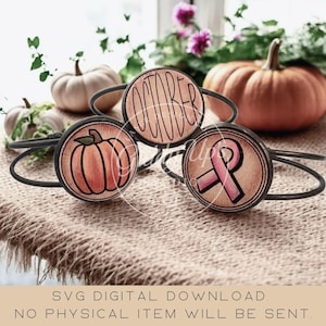 May include: Three black metal bracelets with wooden circular charms. One charm says "OCTOBER", another features a pumpkin, and the third displays a pink ribbon. Pumpkins and foliage are in the background. The text "SVG DIGITAL DOWNLOAD. NO PHYSICAL ITEM WILL BE SENT" is at the bottom.
