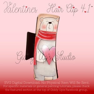 May include: A white bear with a red scarf and a pink heart holds a hair clip that says "Hair Clip 4.1" in white text. The background is pink with the text "Valentines" and "Giddy Up's Studio" in white.