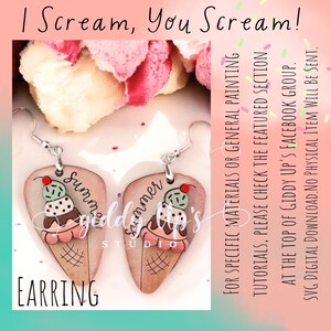 May include: A pair of wooden earrings shaped like ice cream cones with a cherry on top. The earrings are painted with a light brown wood grain pattern and have the words "Summer" and "Giddy Up's Studio" written on them.